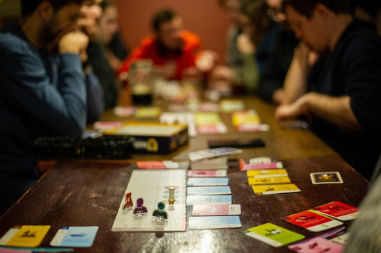 people playing board games