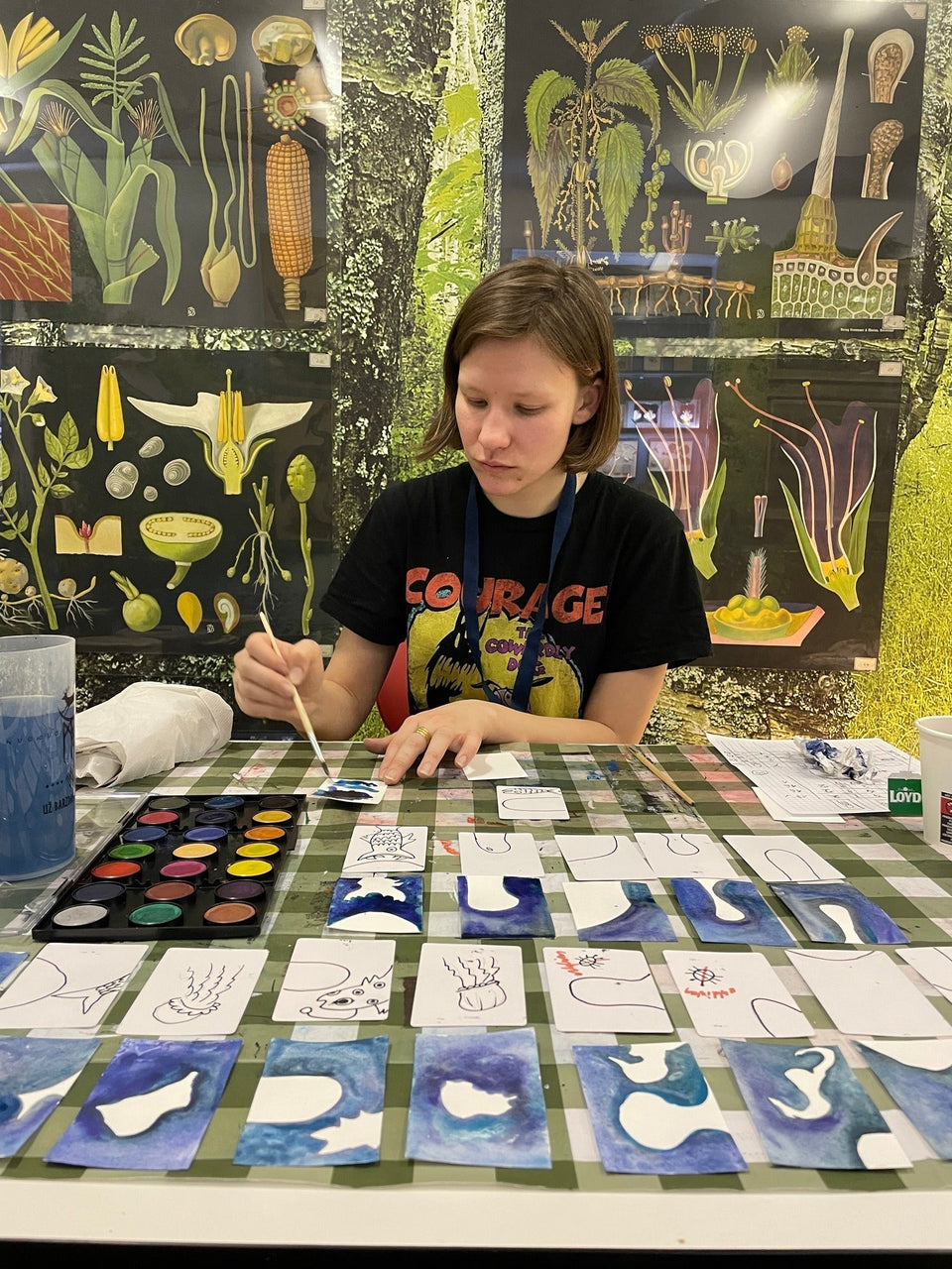 Monika Sadauskaitė Miliauskienė working on Fishe em Up board game prototype