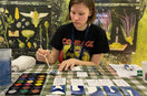 woman drawing board game
