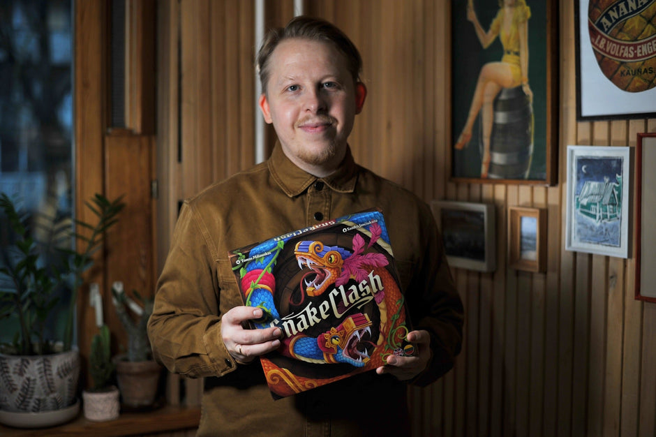 Tomas Miliauskas holding his game Snake Clash